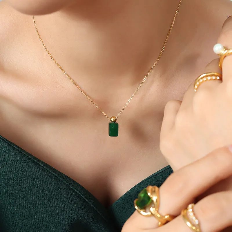 Emerald Glass Pendant Necklace with a Vintage Twist in Gold-Plated Titanium Steel