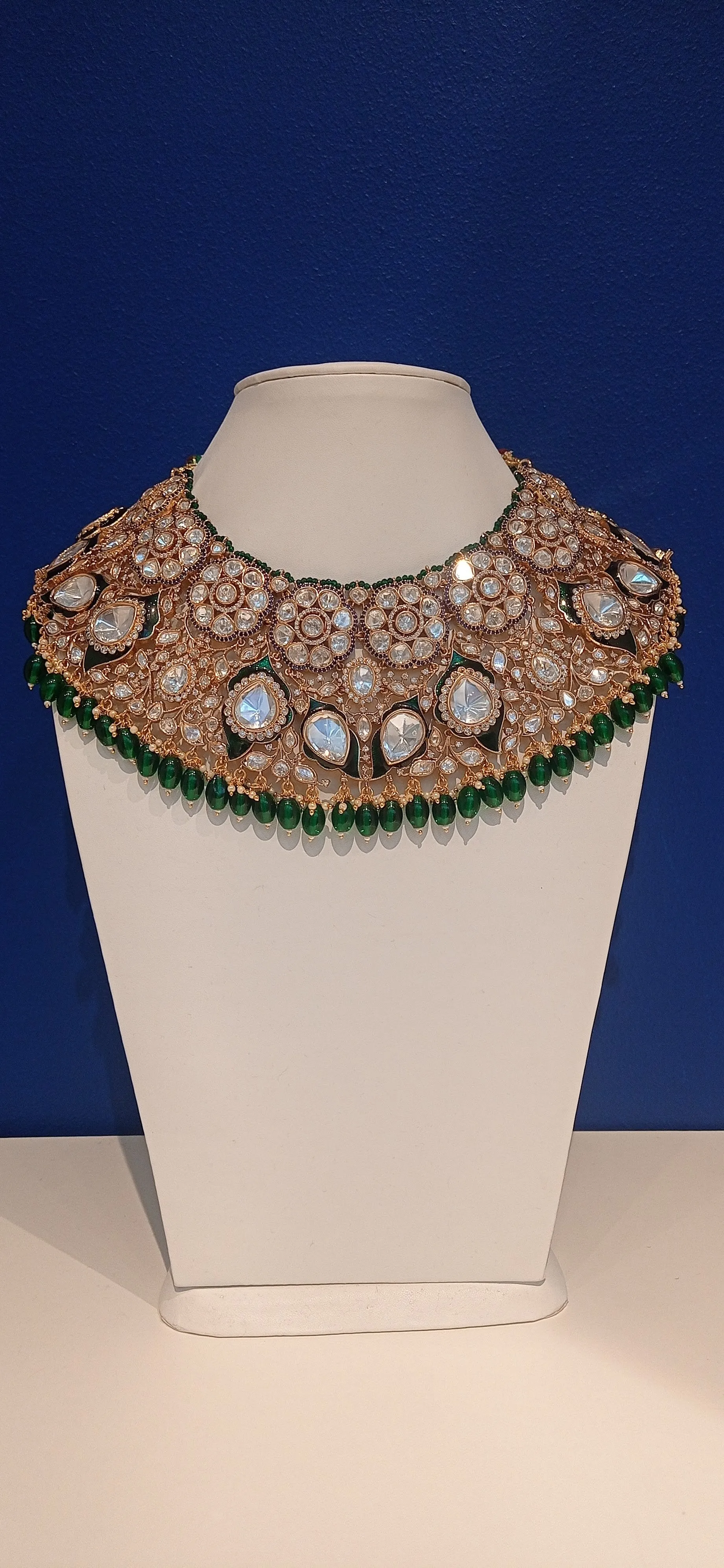 Jodhaa Masterpiece Green and Gold Kundan Bridal Statement Necklace, Earrings, and Mang Teeka Set