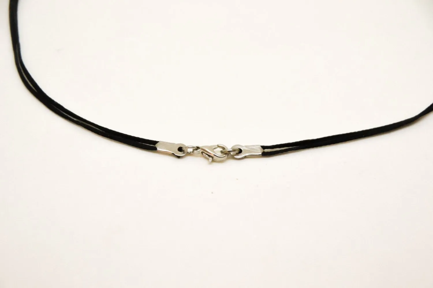 Life is what you make of it necklace for men, silver karma circle, black cord