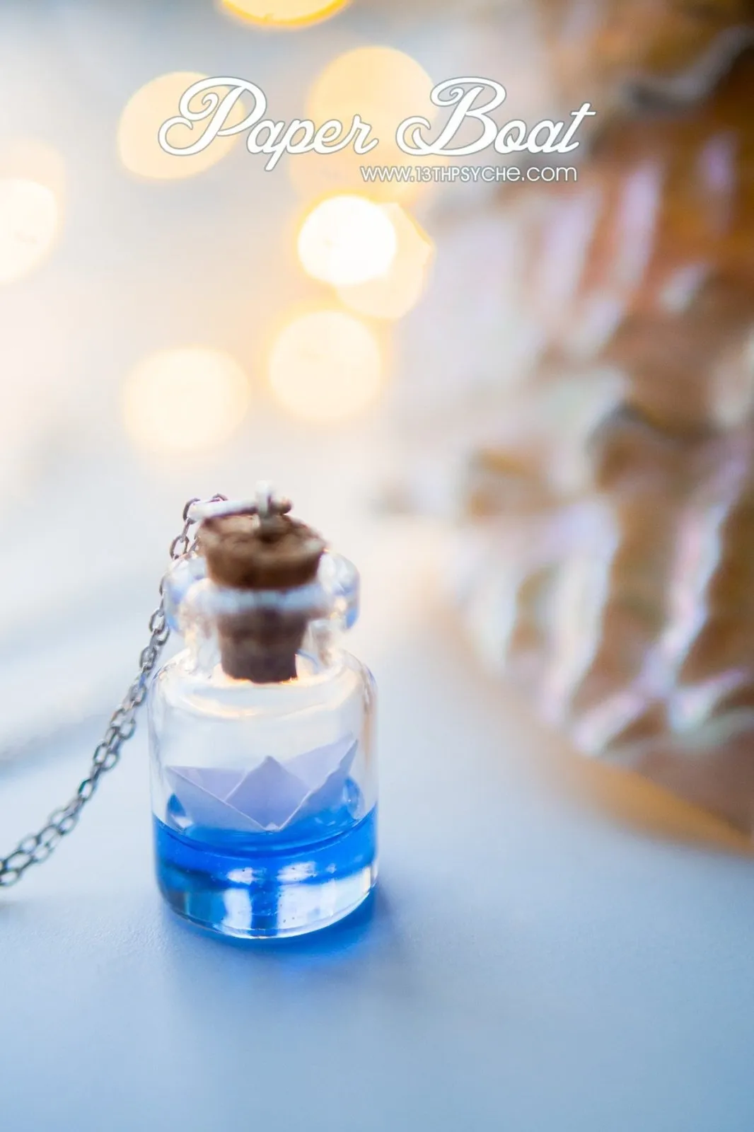 Sterling silver paper boat bottle necklace